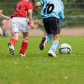 Kids playing football