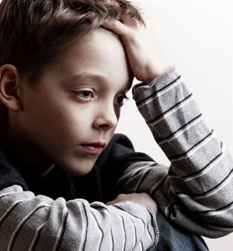 bigstock-Sad-boy-Depressed-teenager-at-30261389